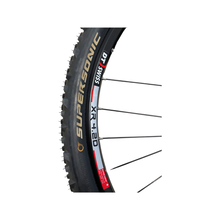 Load image into Gallery viewer, A set of DTSwiss XR 4.2D wheels 26 inch with Continental tires and tubes
